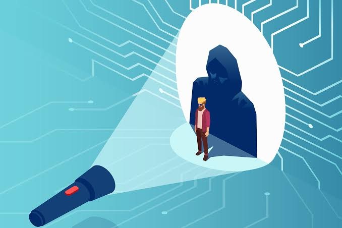 Ilustración de una persona protegida por una cerradura digital frente a una figura que representa una amenaza a la identidad. 
